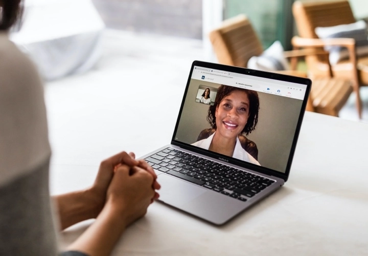 Close up of telemedicine call on laptop