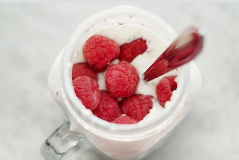 Raspberries in yogurt probiotic foods
