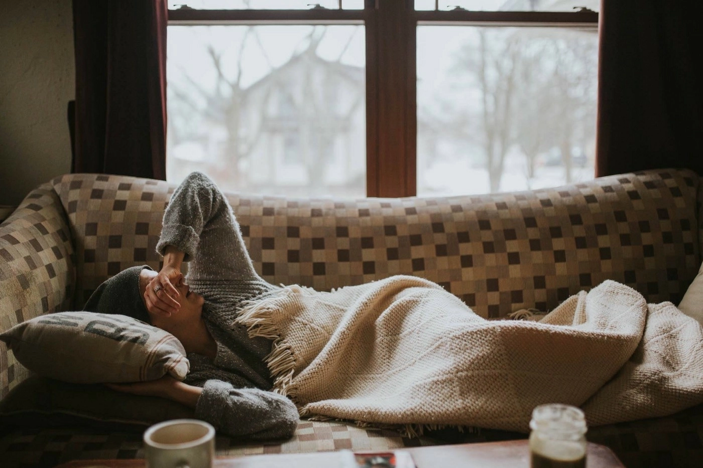 sick with flu on the couch