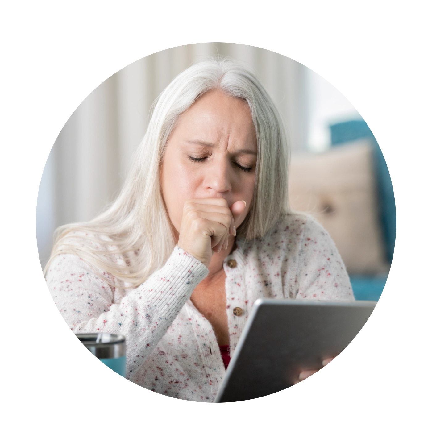 woman with gray hair coughing