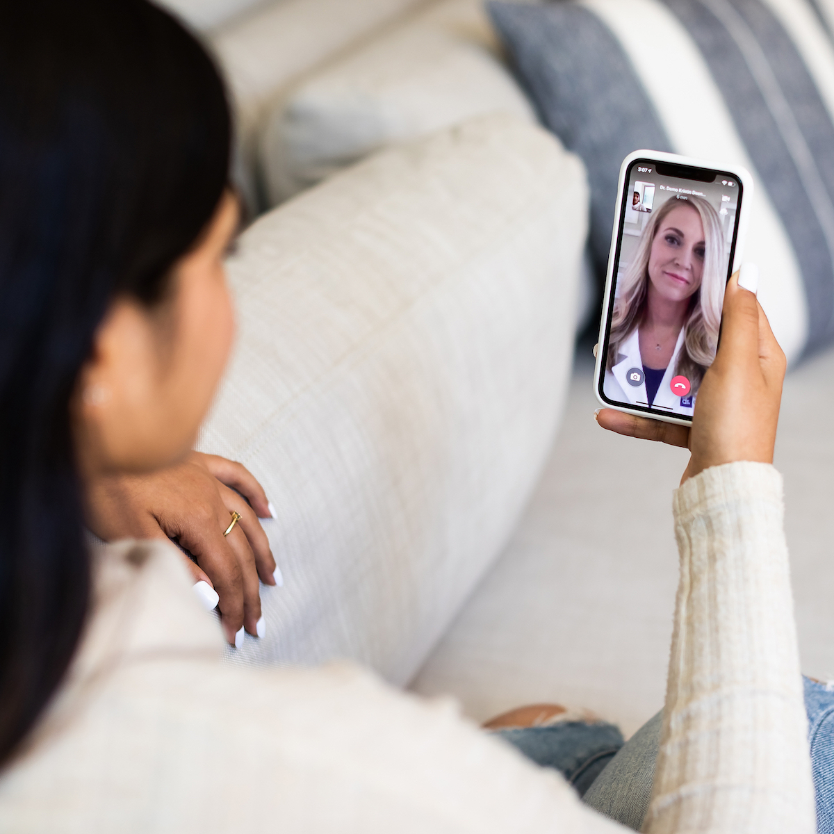 woman on phone with doctor on demand