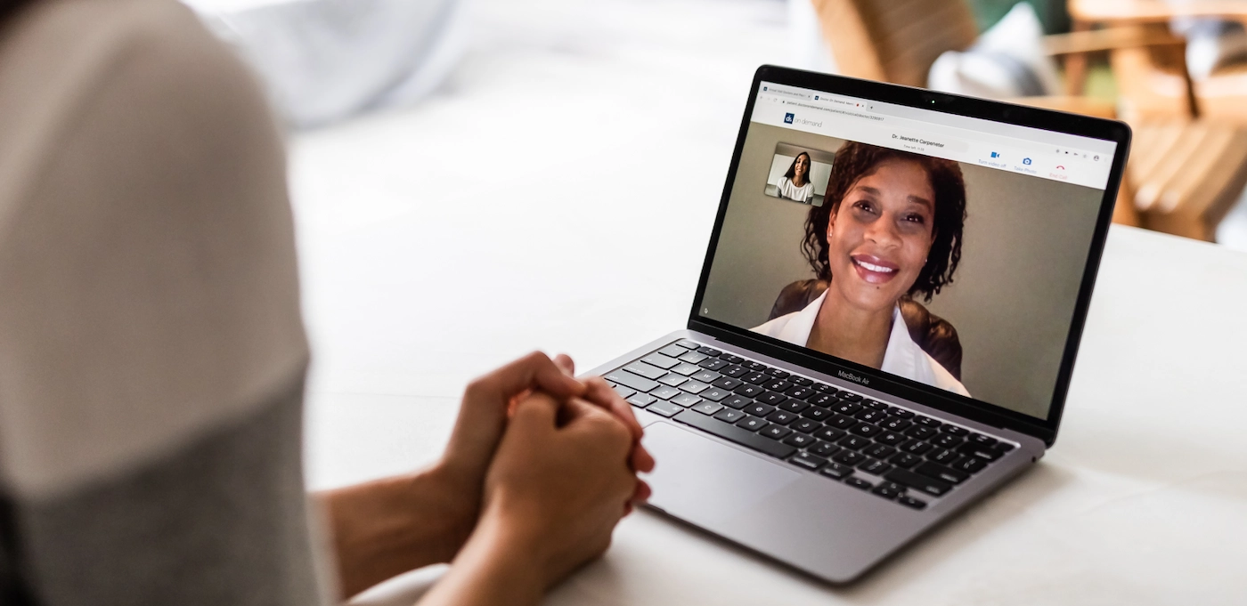 image of person talking to a doctor on a laptop