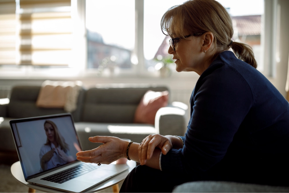 Woman and doctor in Telemedincine video call