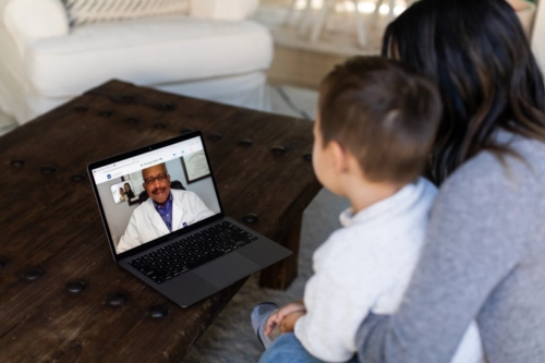 mom and child visiting a Doctor On Demand doctor.