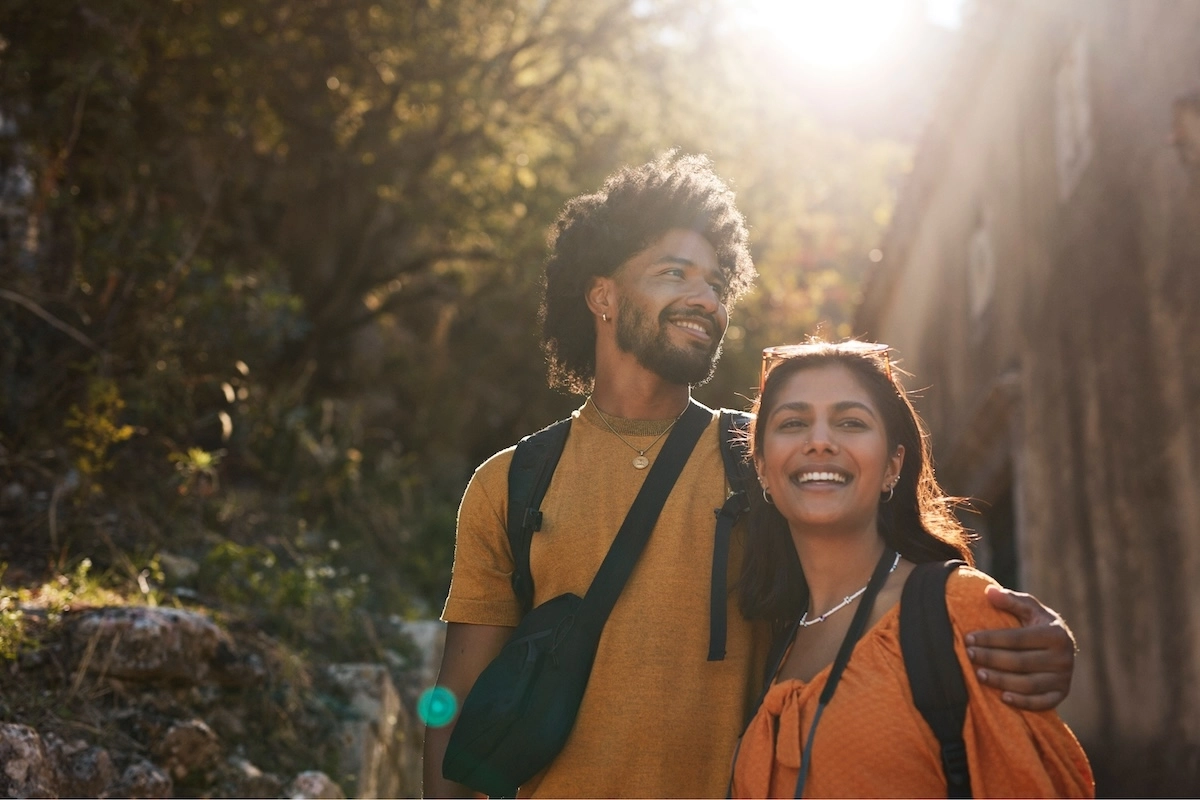 Couple walking arm in arm