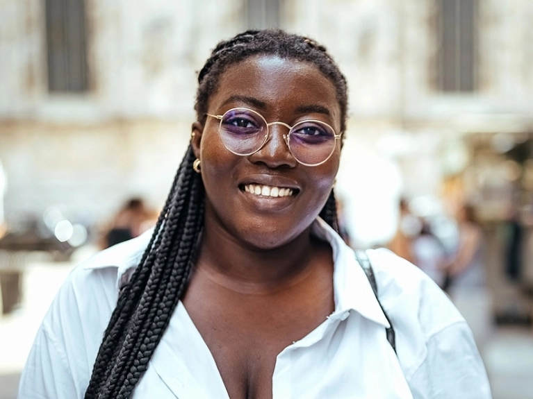 younger woman smiling
