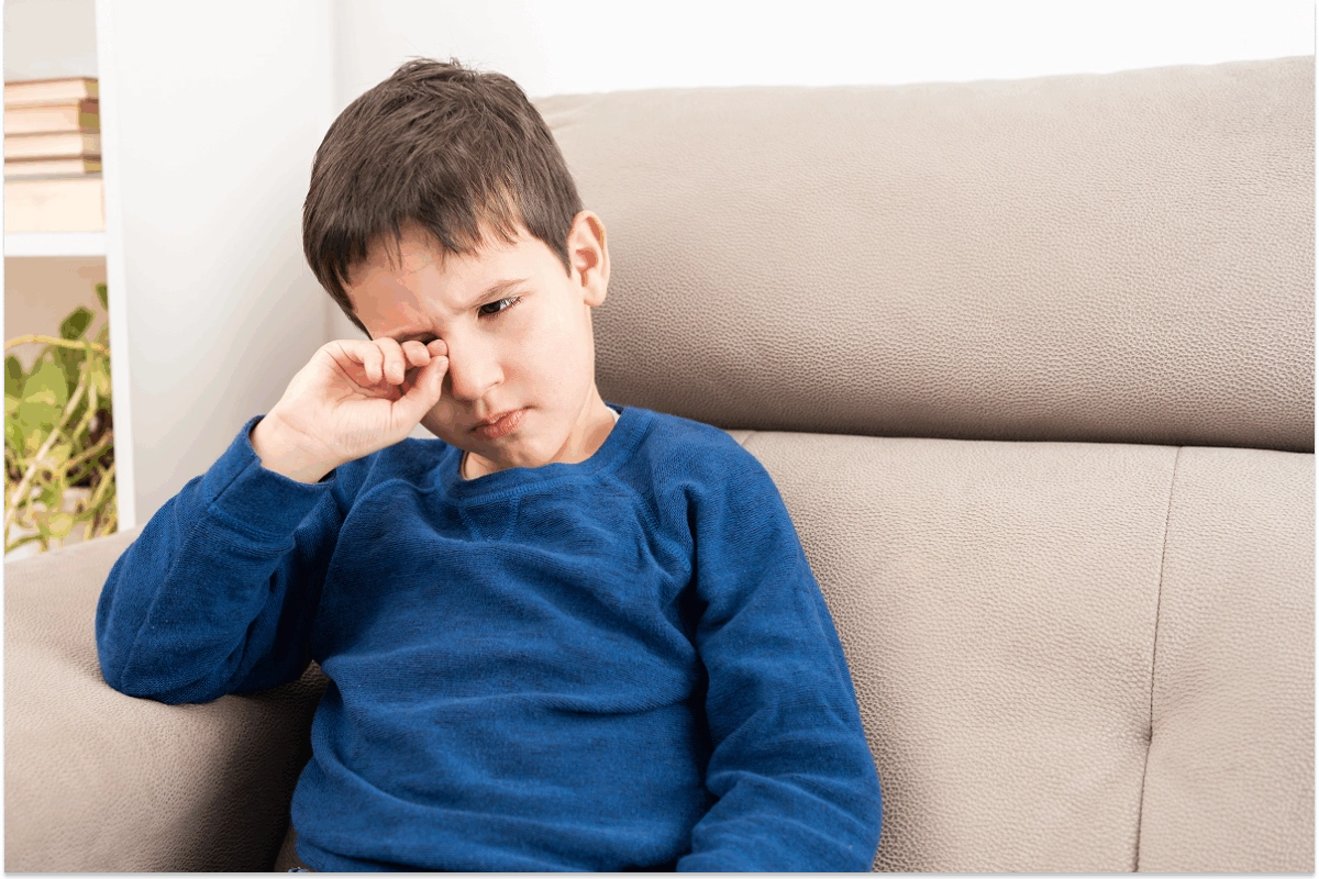 A child itching his eye