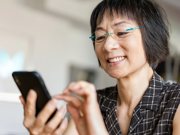 older woman viewing her phone