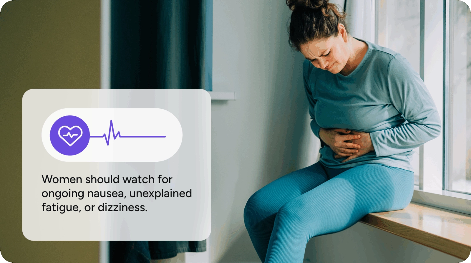 A woman holding her stomach in pain