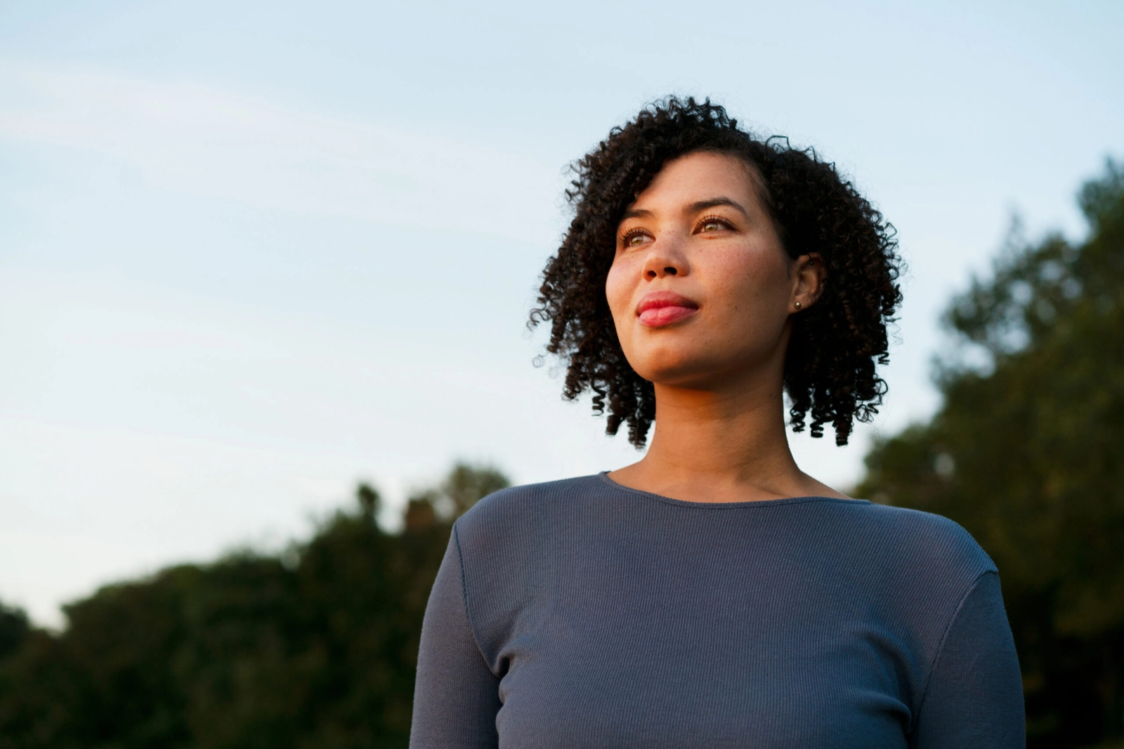 A woman looking off into the distance.